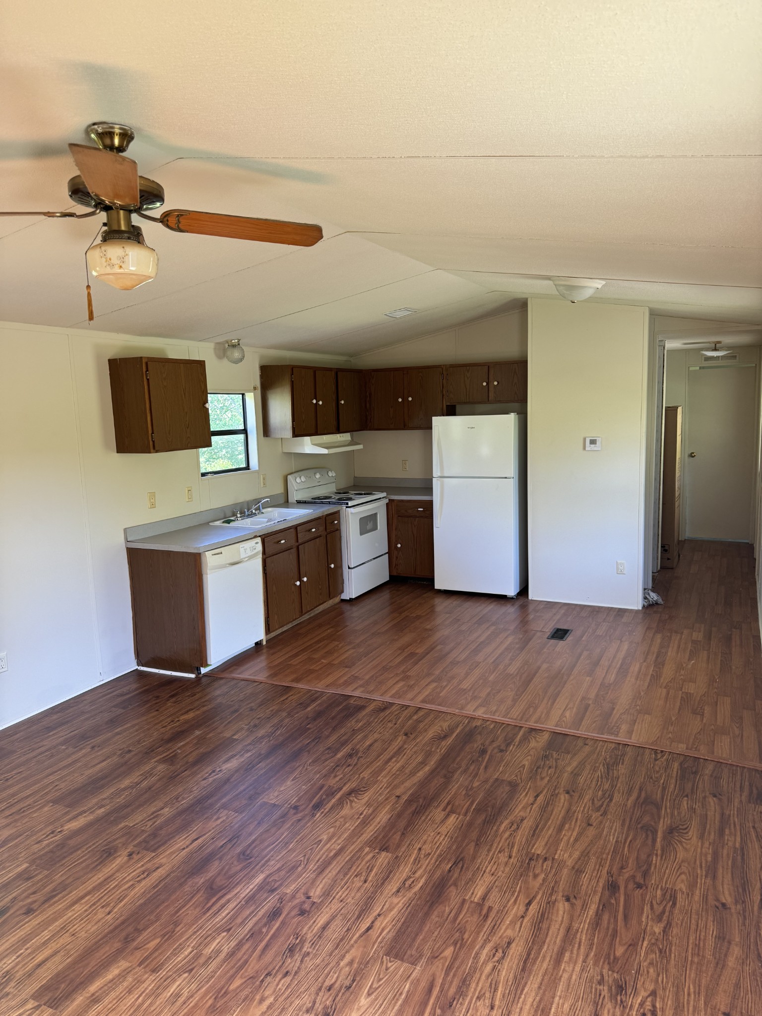 57 Difficult Road Pleasant Shade, TN 37145 - Photo 6 of 18 a kitchen with stainless steel appliances granite countertop a stove and cabinets