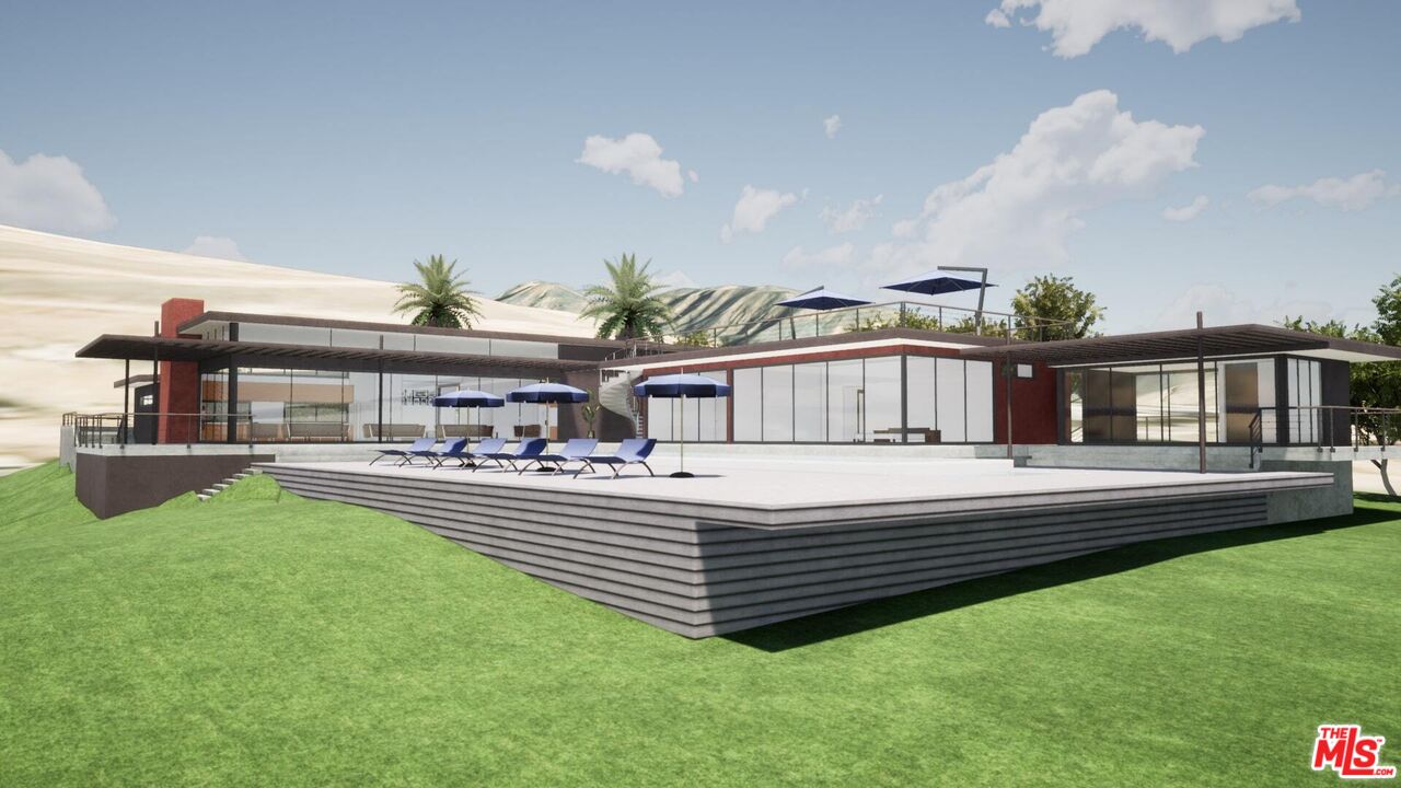 29652 Cuthbert Road Malibu, CA 90265 - Photo 9 of 18 a view of a house with a yard and sitting area