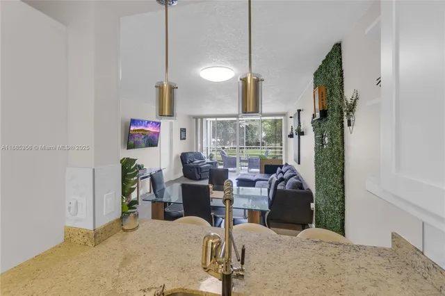 a view of a dining room with furniture