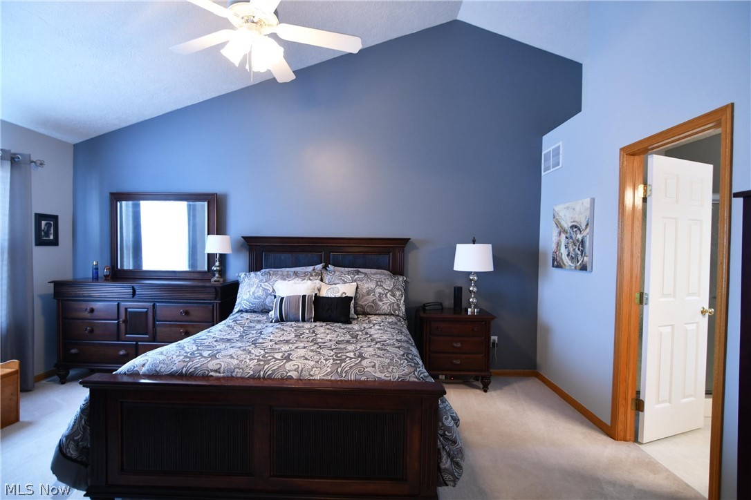 1356 Walnut Ridge Drive Uniontown, OH 44685 - Photo 21 of 35 Master Bedroom with vaulted ceiling and decorative shelf!