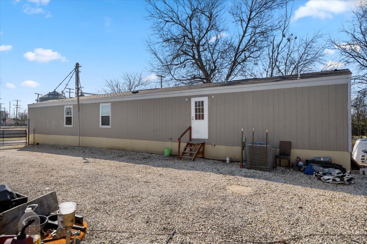 341 Southwest Front Street Bartlett, TX 76511 - Photo 3 of 23 a house view with a backyard space