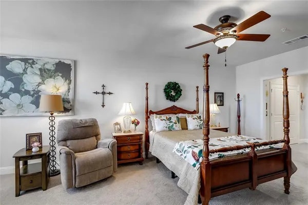 a bed room with a bed furniture and a window
