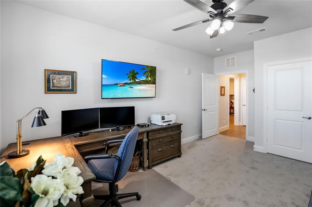 651 Watters Road, Unit 3302 Allen, TX 75013 - Photo 17 of 40 Second bedroom being used as an office. Plantation shutters in this room as well.