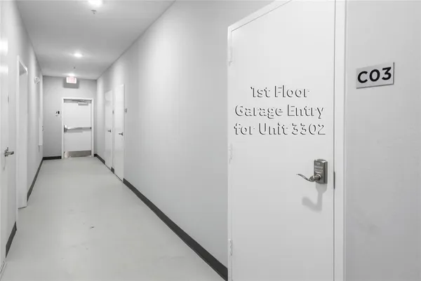 a bathroom with a shower and a sink