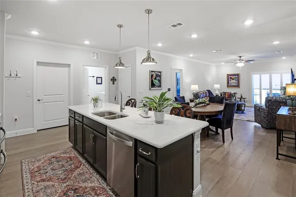 a kitchen with a table and chairs in it