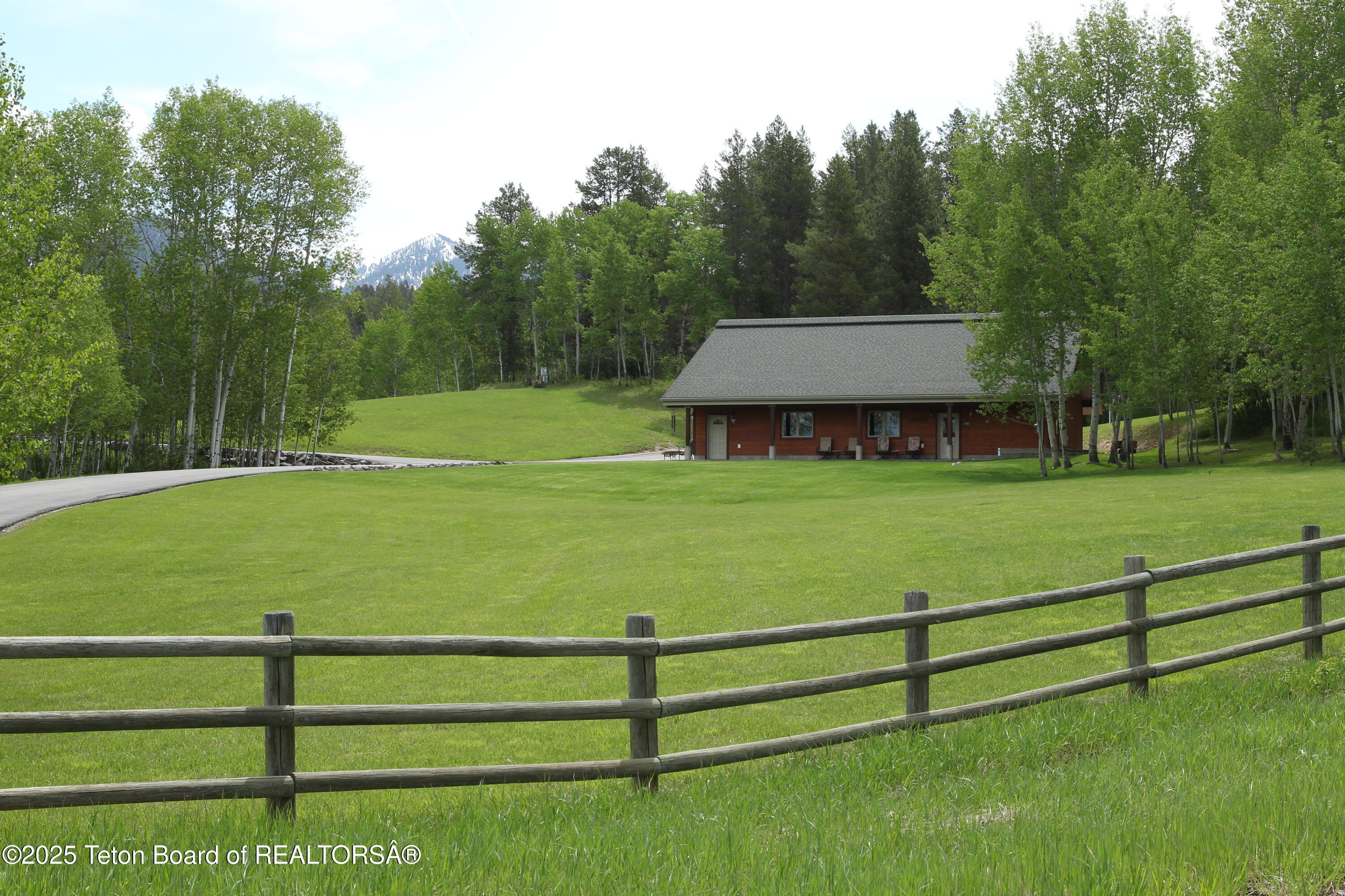278 Dell Creek Road Alpine, WY 83128 - Photo 1 of 1 Property 2 NW Side of House from Fence