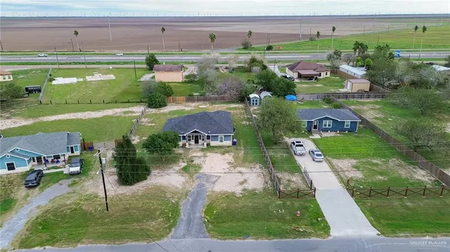 a view of a lake with a building in the background
