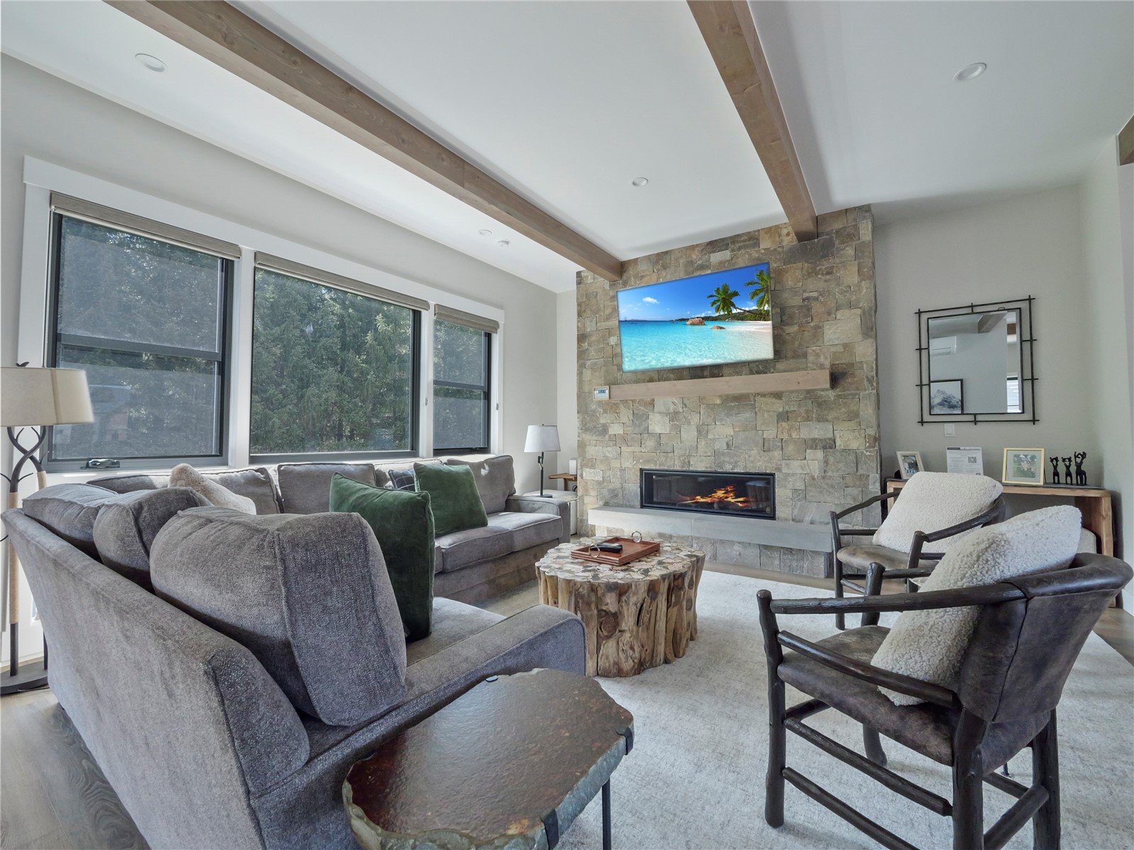 75 Alcove Court, Unit 75 Keystone, CO 80435 - Photo 3 of 40 a living room with furniture and a large window