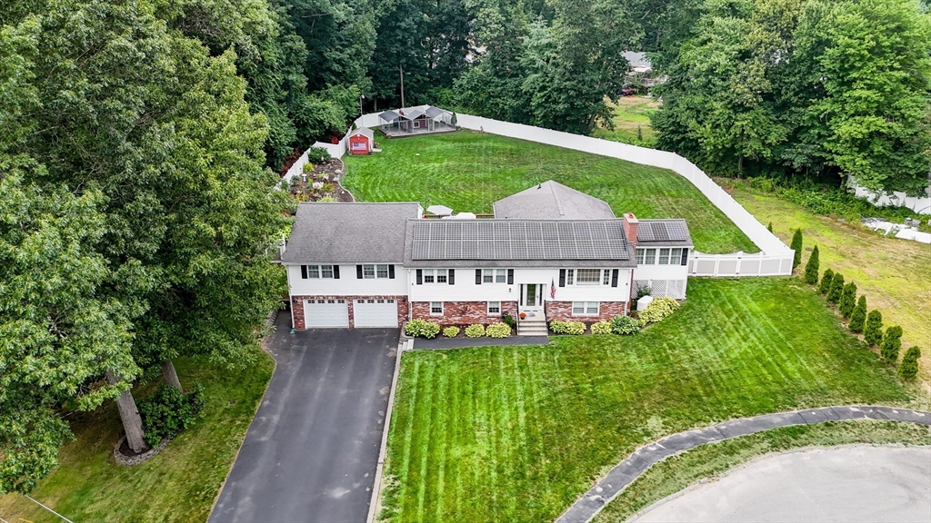 6 Montclair Circle Billerica, MA 01821 - Photo 2 of 42 a view of a house with a big yard plants and large trees