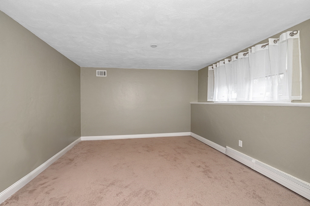 6 Montclair Circle Billerica, MA 01821 - Photo 32 of 42 an empty room with windows