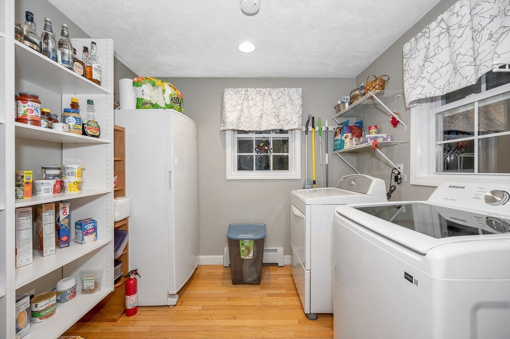 6 Montclair Circle Billerica, MA 01821 - Photo 9 of 42 a kitchen with a refrigerator and window
