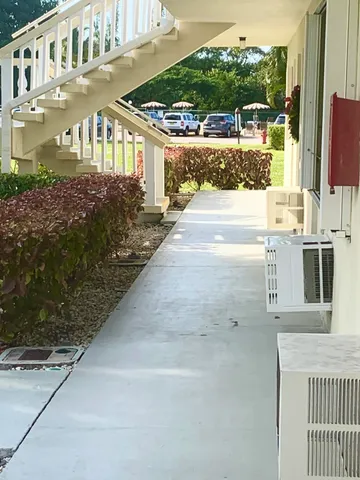 a view of a house with a street