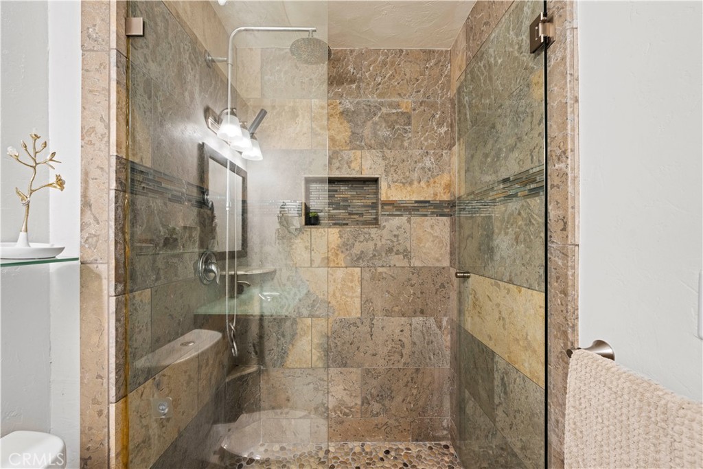 23255 Redbud Ridge Circle Valencia, CA 91354 - Photo 15 of 19 a bathroom with a shower and toilet