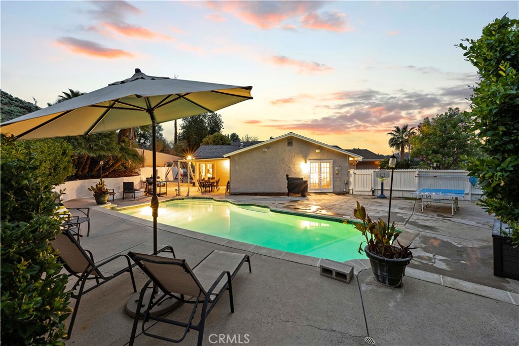 23255 Redbud Ridge Circle Valencia, CA 91354 - Photo 6 of 19 a view of a backyard with sitting area