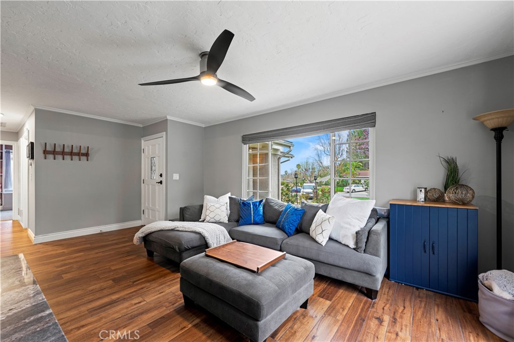 23255 Redbud Ridge Circle Valencia, CA 91354 - Photo 8 of 19 a living room with furniture and a wooden floor