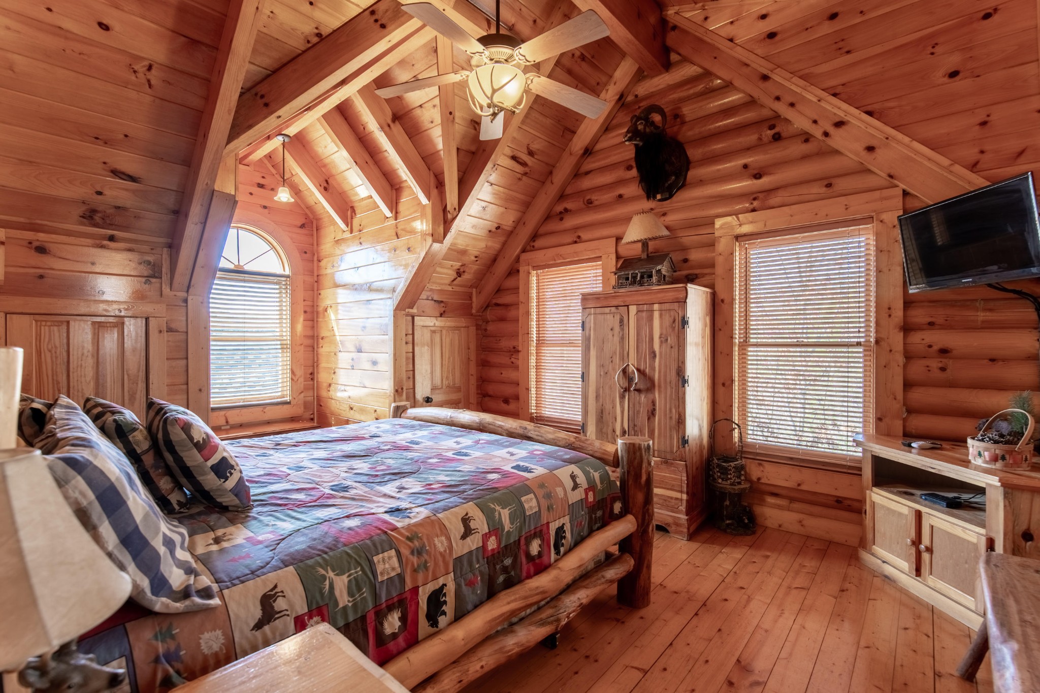 3005 Redtail Road Sevierville, TN 37862 - Photo 19 of 37 a bed sitting in a bedroom next to a window