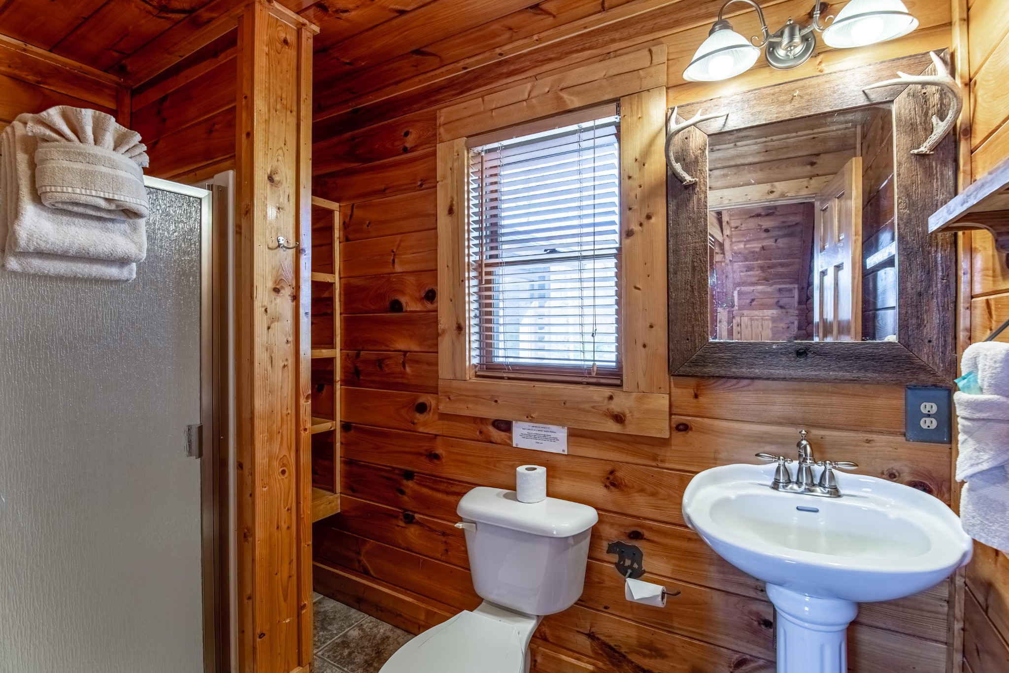 3005 Redtail Road Sevierville, TN 37862 - Photo 22 of 37 a bathroom with a sink and a mirror