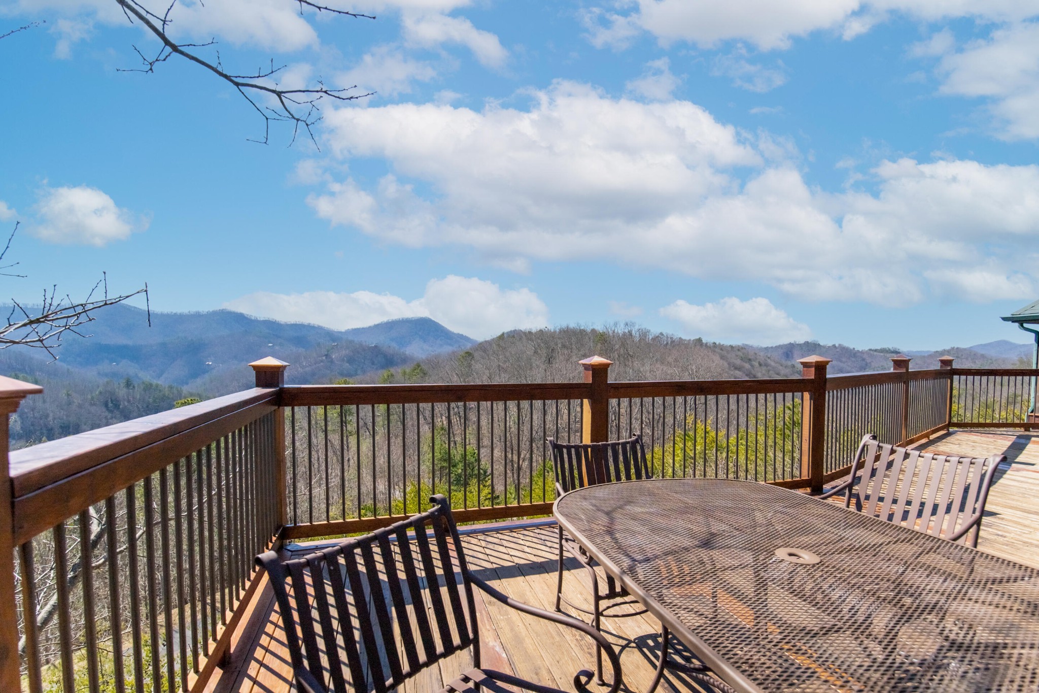 3005 Redtail Road Sevierville, TN 37862 - Photo 30 of 37 a view of a balcony with wooden chairs