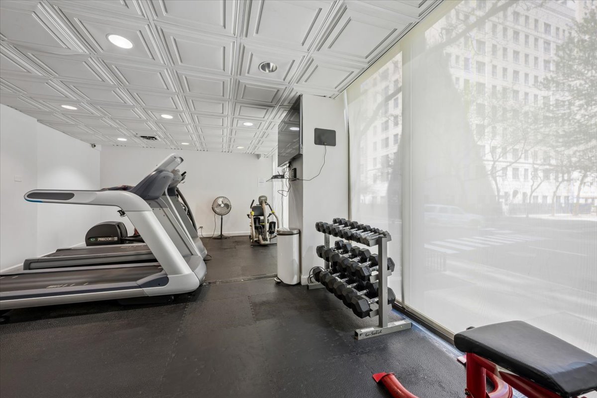 253 East Delaware Place, Unit 11F Chicago, IL 60611 - Photo 19 of 19 a view of a room with gym equipment