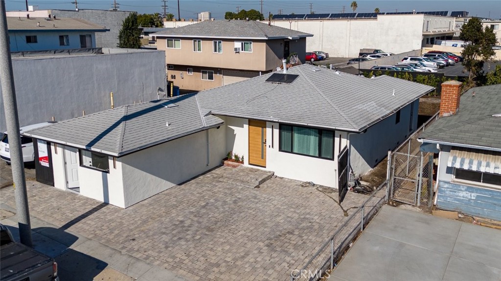 a aerial view of a house with sitting area