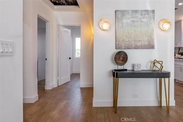 a bedroom with a bed and chair