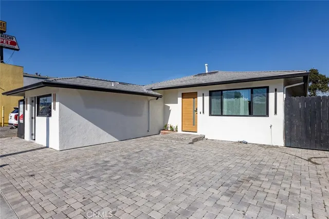 a view of a door and a window