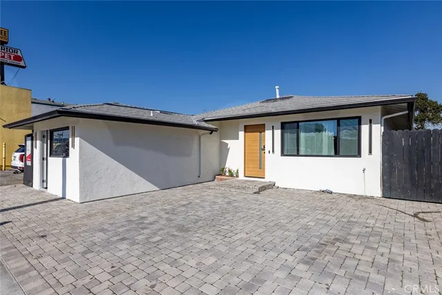 a view of a door and a window