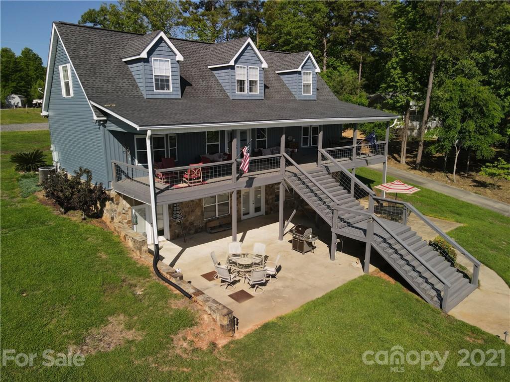 437 State Rd S-20-457 Ridgeway, SC 29130 - Photo 4 of 48 a aerial view of a house with swimming pool