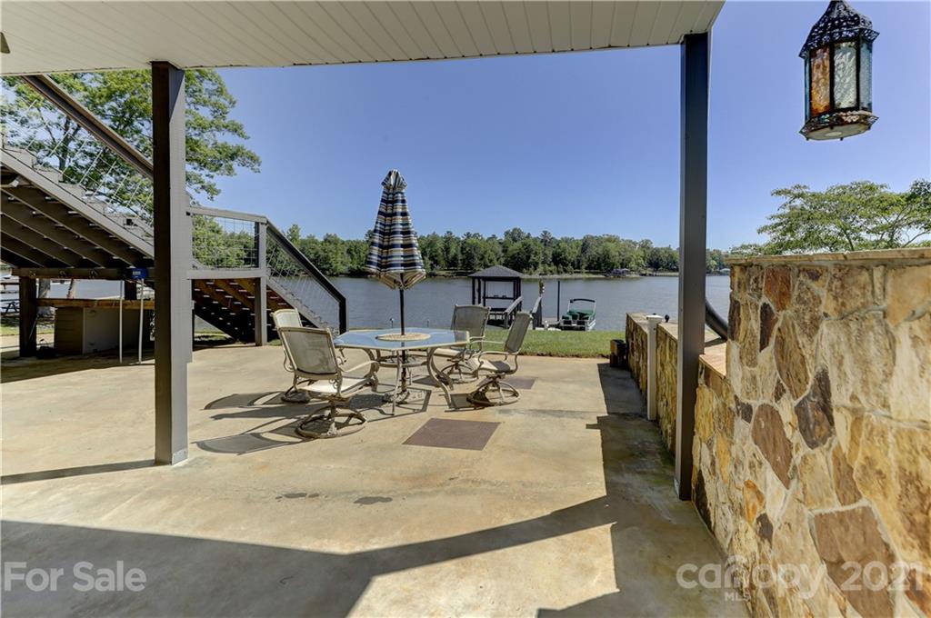 437 State Rd S-20-457 Ridgeway, SC 29130 - Photo 36 of 48 a view of a balcony with table and chairs
