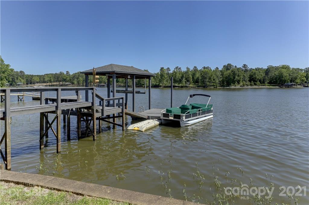 437 State Rd S-20-457 Ridgeway, SC 29130 - Photo 41 of 48 a view of a lake with outdoor seating