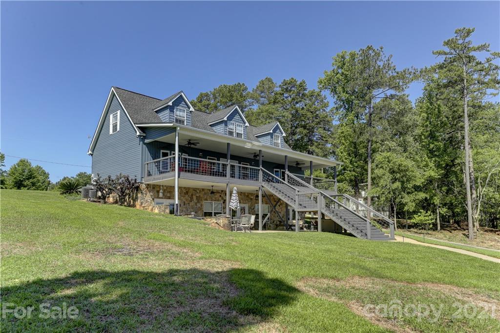 437 State Rd S-20-457 Ridgeway, SC 29130 - Photo 46 of 48 a view of a house with a big yard and large trees