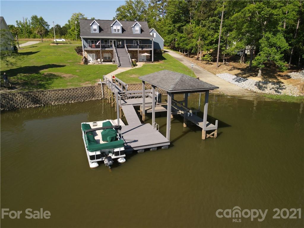 437 State Rd S-20-457 Ridgeway, SC 29130 - Photo 6 of 48 a view of a ocean with lawn chairs