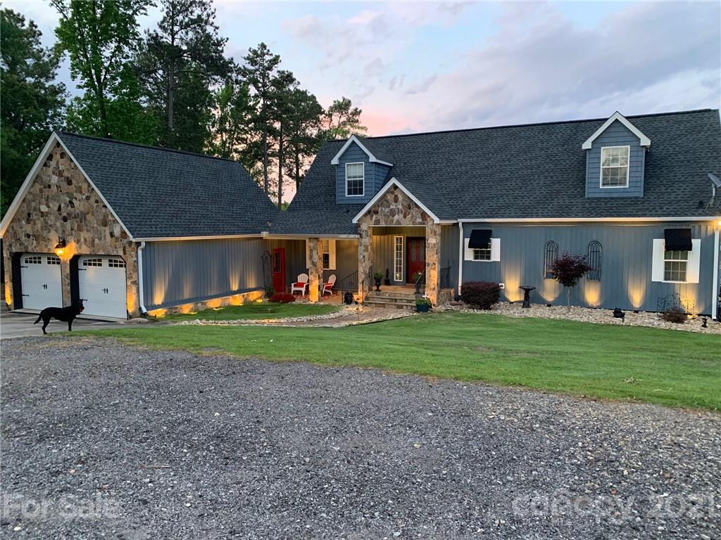 437 State Rd S-20-457 Ridgeway, SC 29130 - Photo 10 of 48 a front view of a house with garden