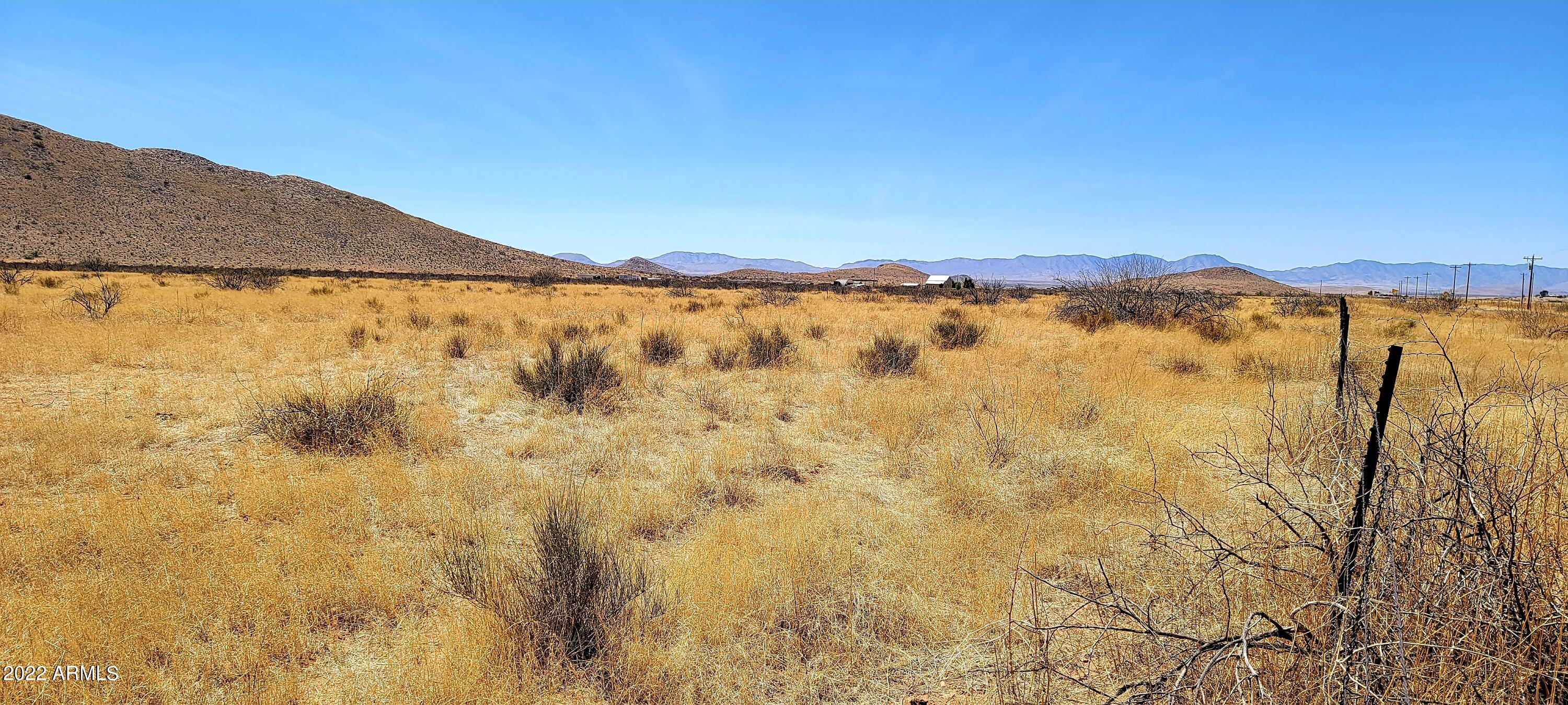 Lot 3 Highway 181, Unit 3 Pearce, AZ 85625 - Photo 2 of 3 a view of a dry yard with mountain in the background