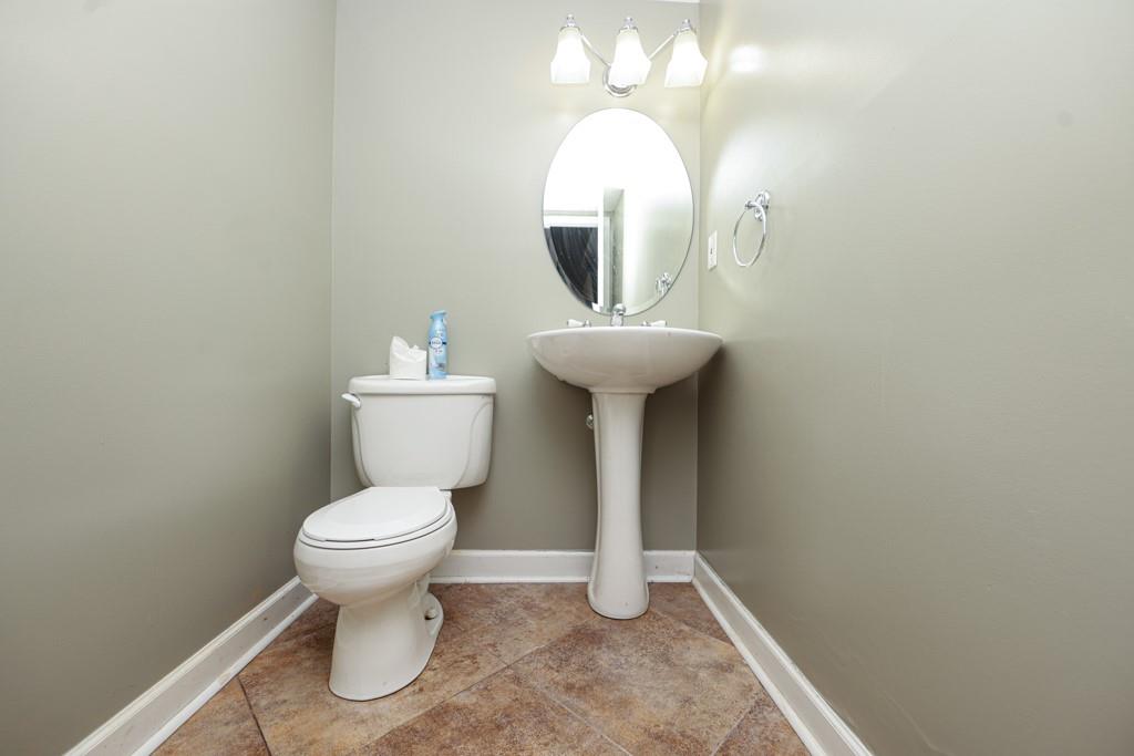 1101 Scott Boulevard Decatur, GA 30030 - Photo 14 of 27 a bathroom with a toilet sink and mirror