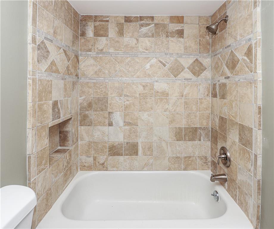 1101 Scott Boulevard Decatur, GA 30030 - Photo 19 of 27 a bathroom with a bathtub
