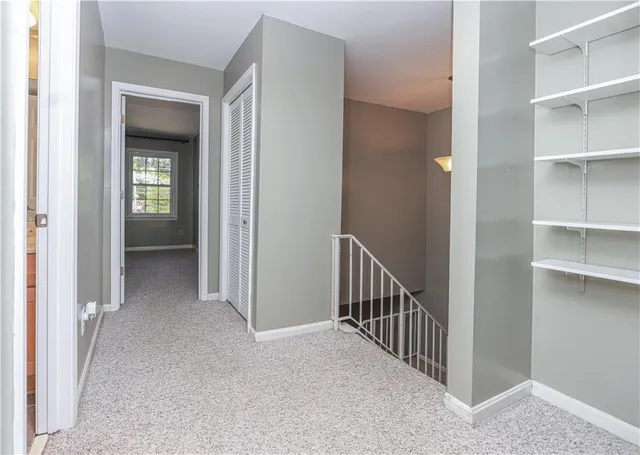 a bathroom with a sink a toilet and a shower