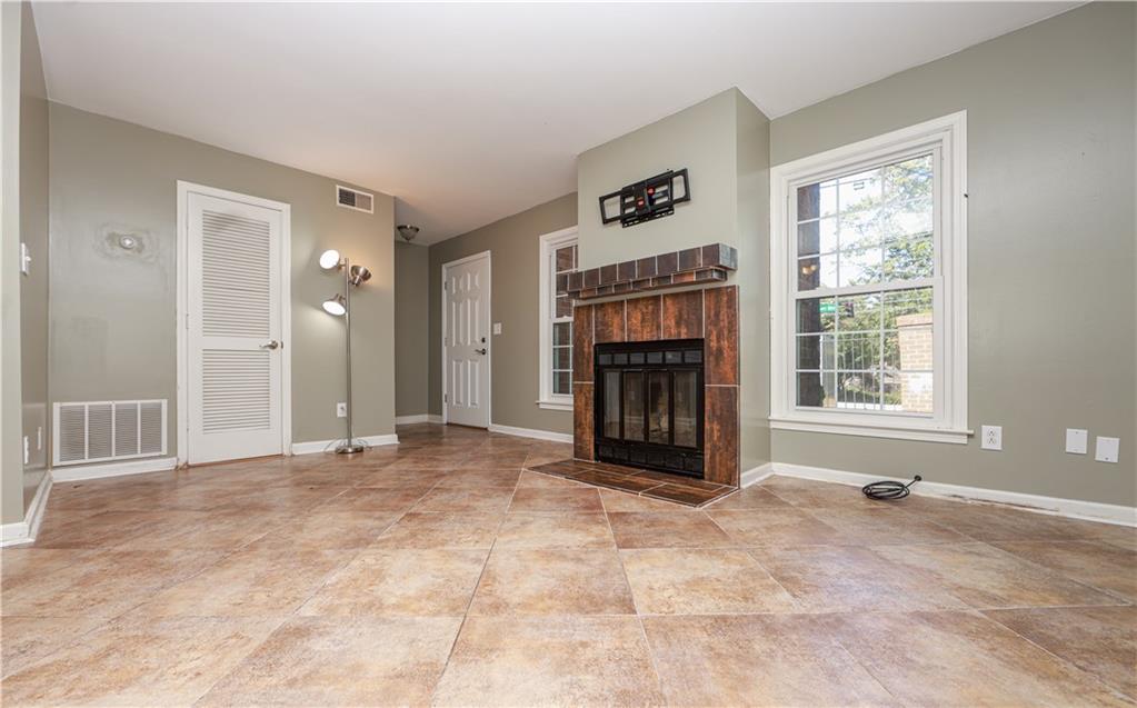 1101 Scott Boulevard Decatur, GA 30030 - Photo 5 of 27 a view of an empty room with window and fire place