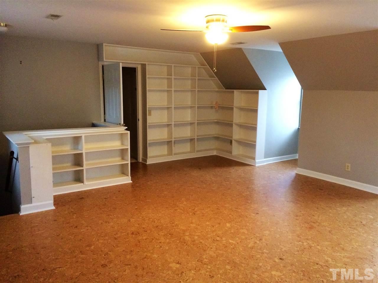 3344 Harden Road Raleigh, NC 27607 - Photo 22 of 25 a view of a room with wooden walls
