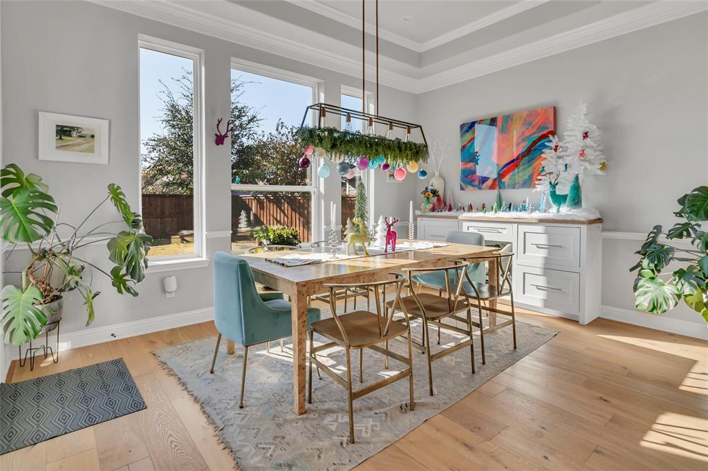 13753 Green Elm Road Fort Worth, TX 76008 - Photo 16 of 38 a view of a dining room with furniture window and wooden floor