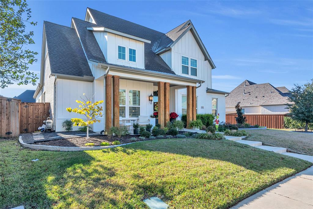 13753 Green Elm Road Fort Worth, TX 76008 - Photo 2 of 38 a front view of a house with garden