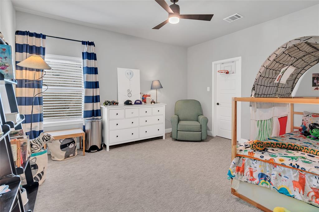 13753 Green Elm Road Fort Worth, TX 76008 - Photo 28 of 38 a bedroom with furniture and a window