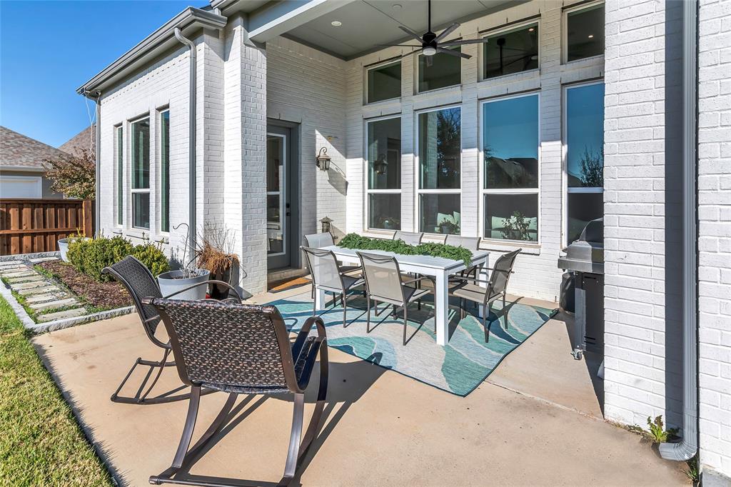 13753 Green Elm Road Fort Worth, TX 76008 - Photo 33 of 38 a view of a patio with table and chairs and potted plants