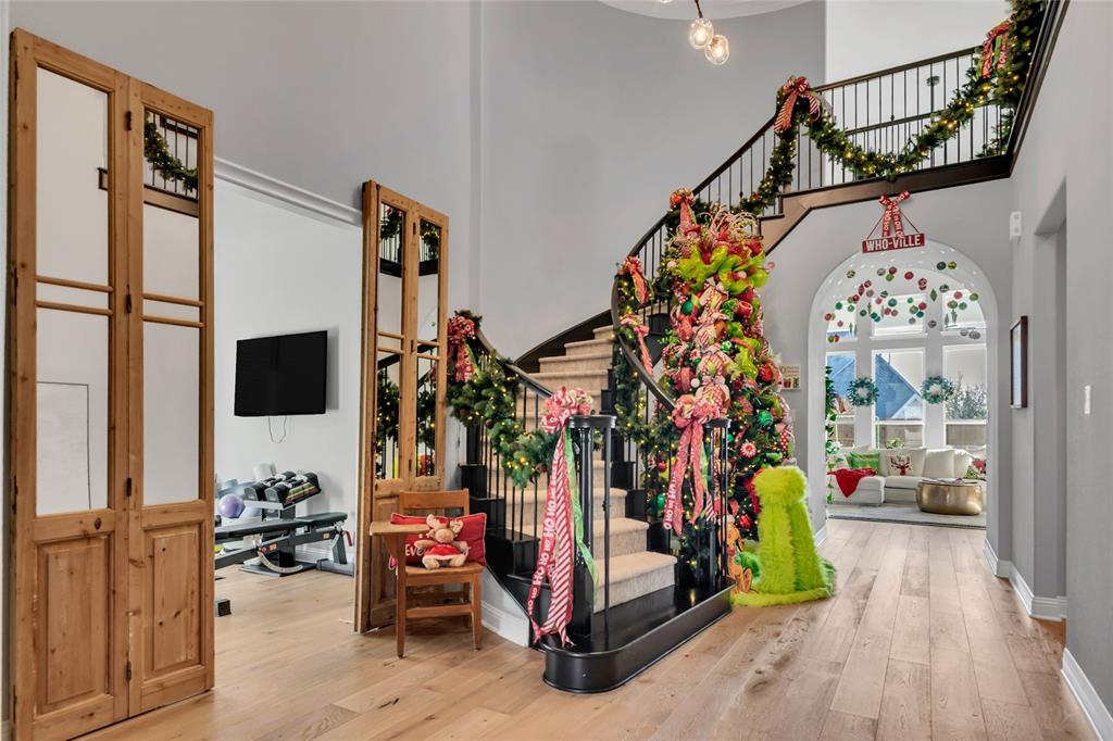 13753 Green Elm Road Fort Worth, TX 76008 - Photo 5 of 38 a view of gym equipment and children play room