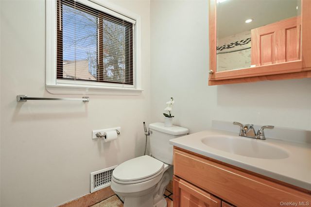 a bathroom with a sink and a toilet