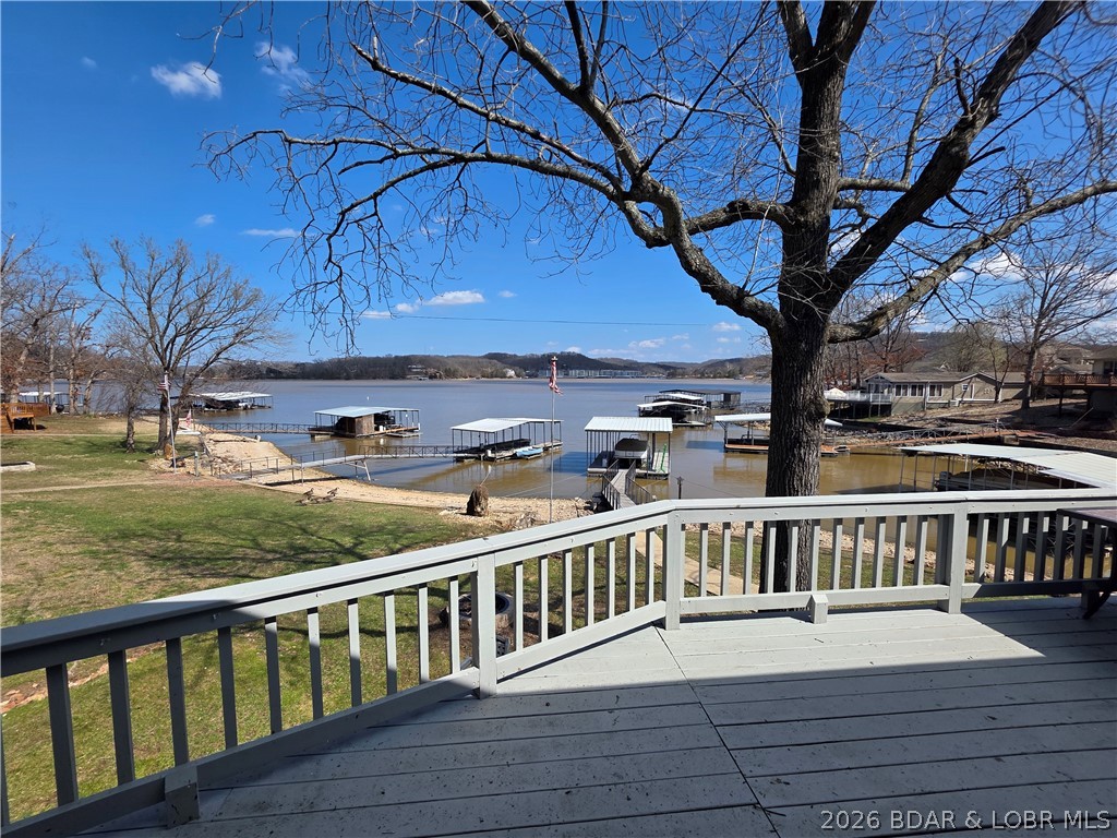 336 Boot Circle Camdenton, MO 65020 - Photo 5 of 48 Deck upper & lower all the way across lake side of