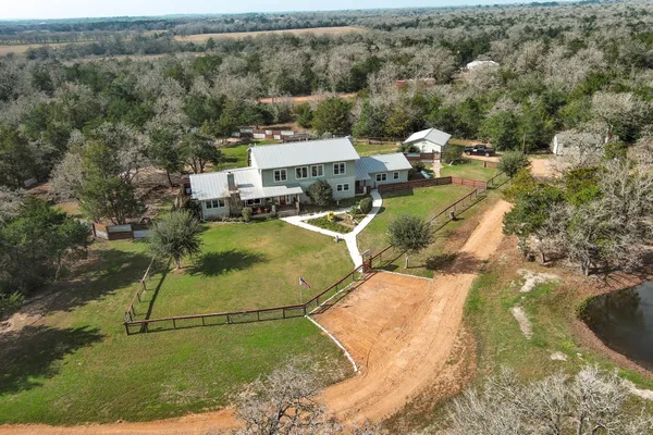 $1,299,900 | 418 Vyvjala Road, Smithville, TX 78957