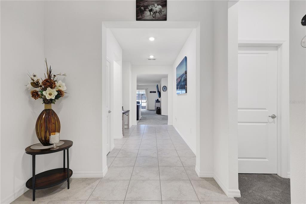 7185 Southwest 63rd Street Ocala, FL 34474 - Photo 8 of 31 a view of hallway with furniture