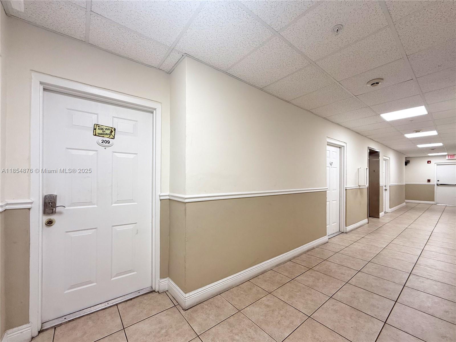 3201 West Flagler Street, Unit 209 Miami, FL 33135 - Photo 2 of 13 a view of a hallway