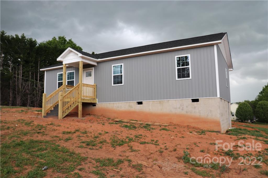92 24th Street Northwest Hickory, NC 28601 - Photo 5 of 10 a house view with a backyard space